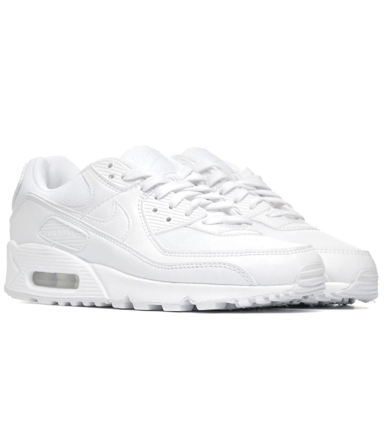 A pair of white Nike Air Max 90 sneakers with lace-up closure.