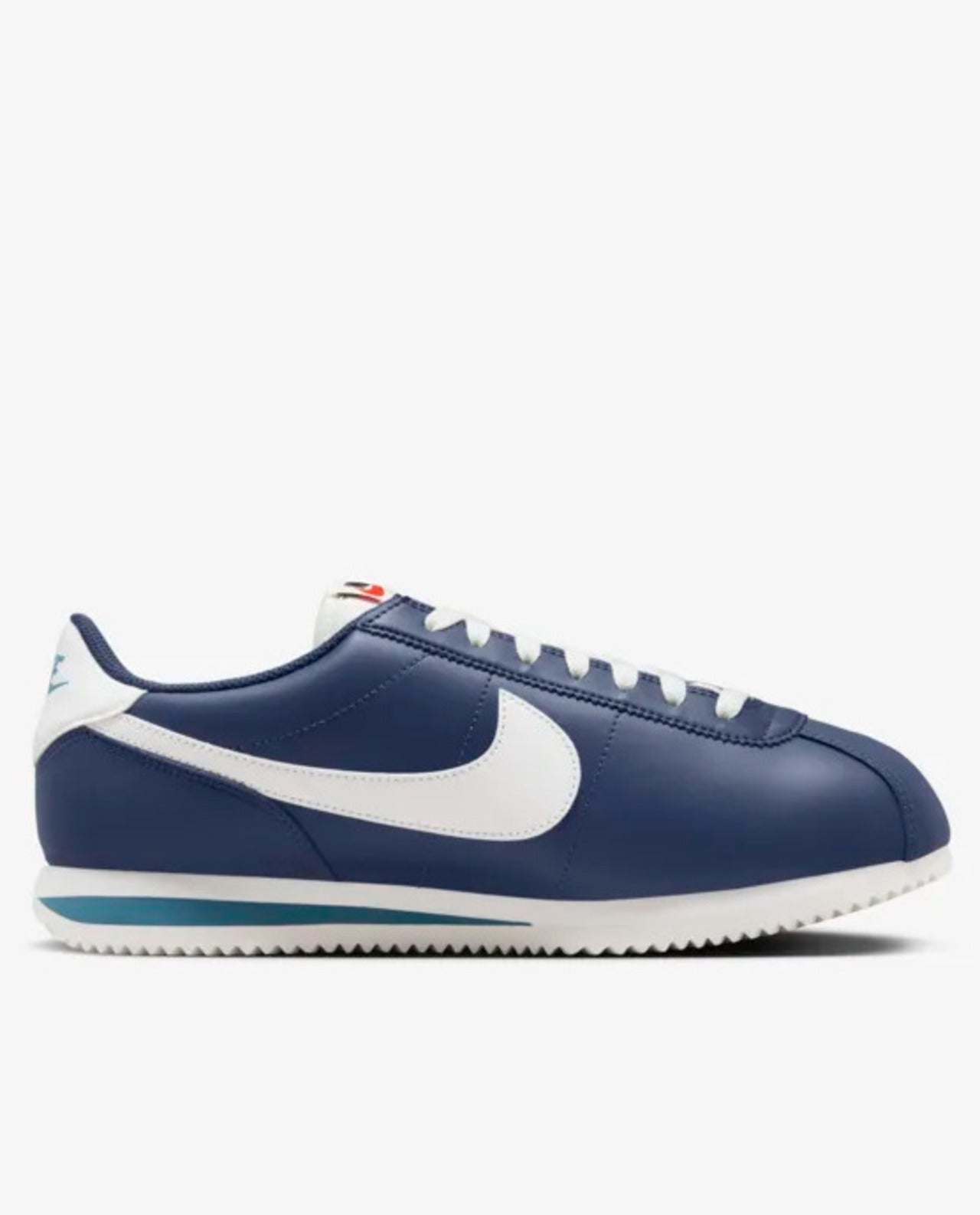 A pair of blue Nike Cortez sneakers with white accents and a visible 'Nike' logo on the heel.