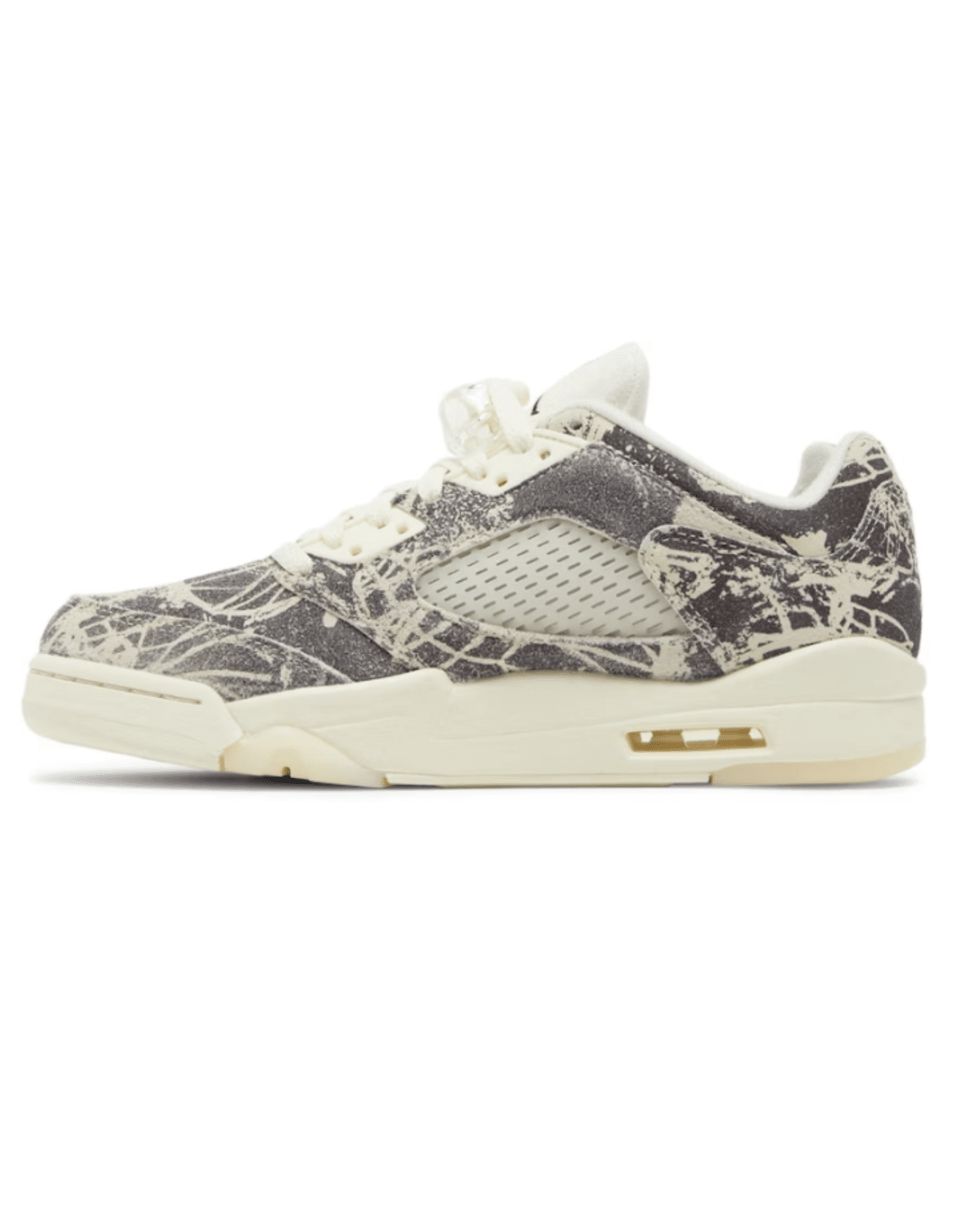 A pair of women's Air Jordan 5 Retro sneakers with a suede upper in an abstract pattern, black Jumpman logos, and a milky translucent outsole.