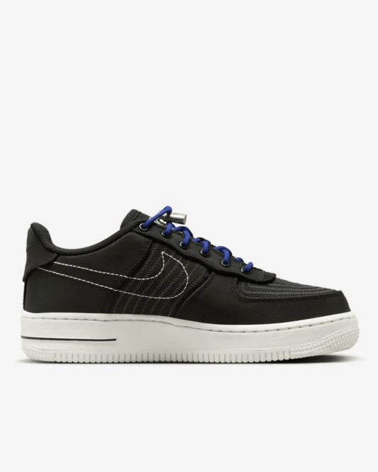 Nike Air Force 1 '07 sneakers with black upper, white sole, and blue laces.