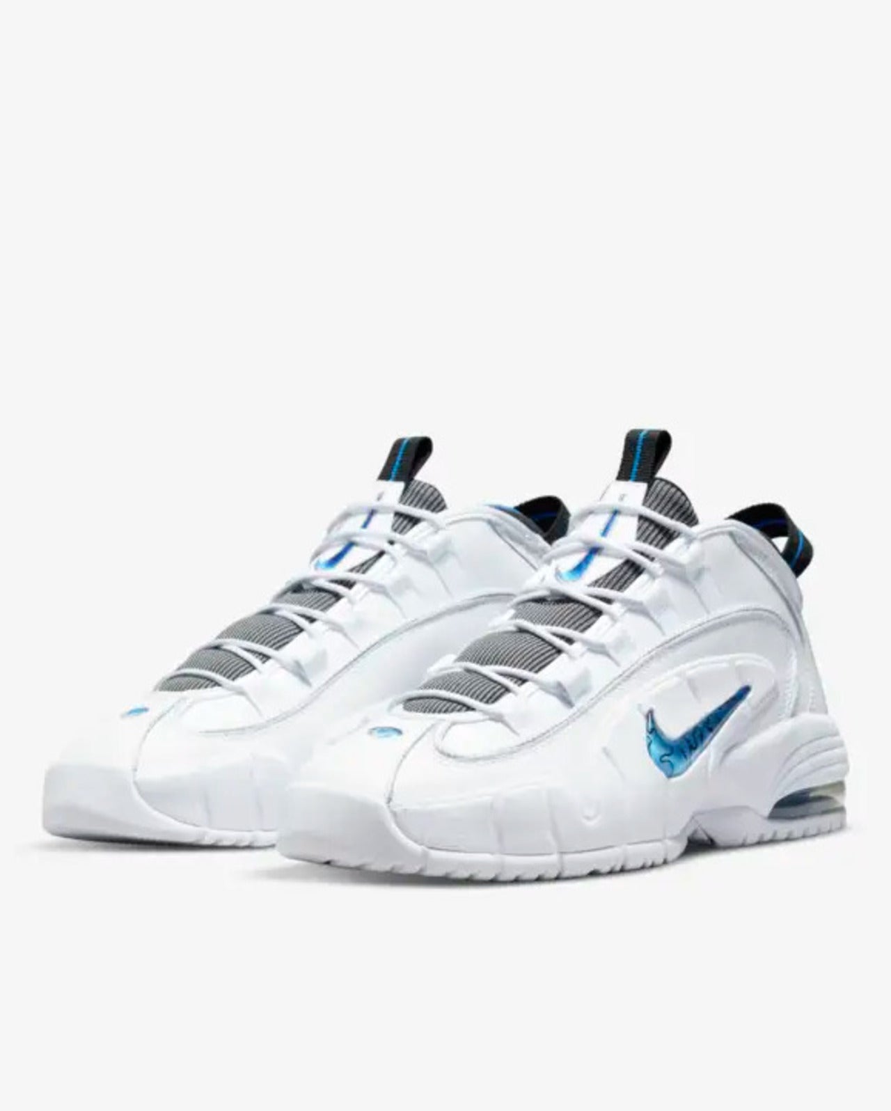 A pair of white Nike Air Max Penny sneakers with blue accents and textural details.