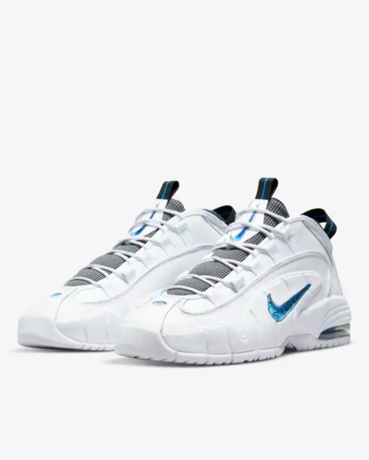 A pair of white Nike Air Max Penny sneakers with blue accents and textural details.